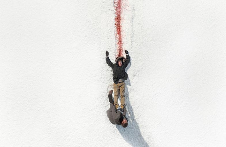 A dead body is dragged against white snow, promo pic for fargo season 2